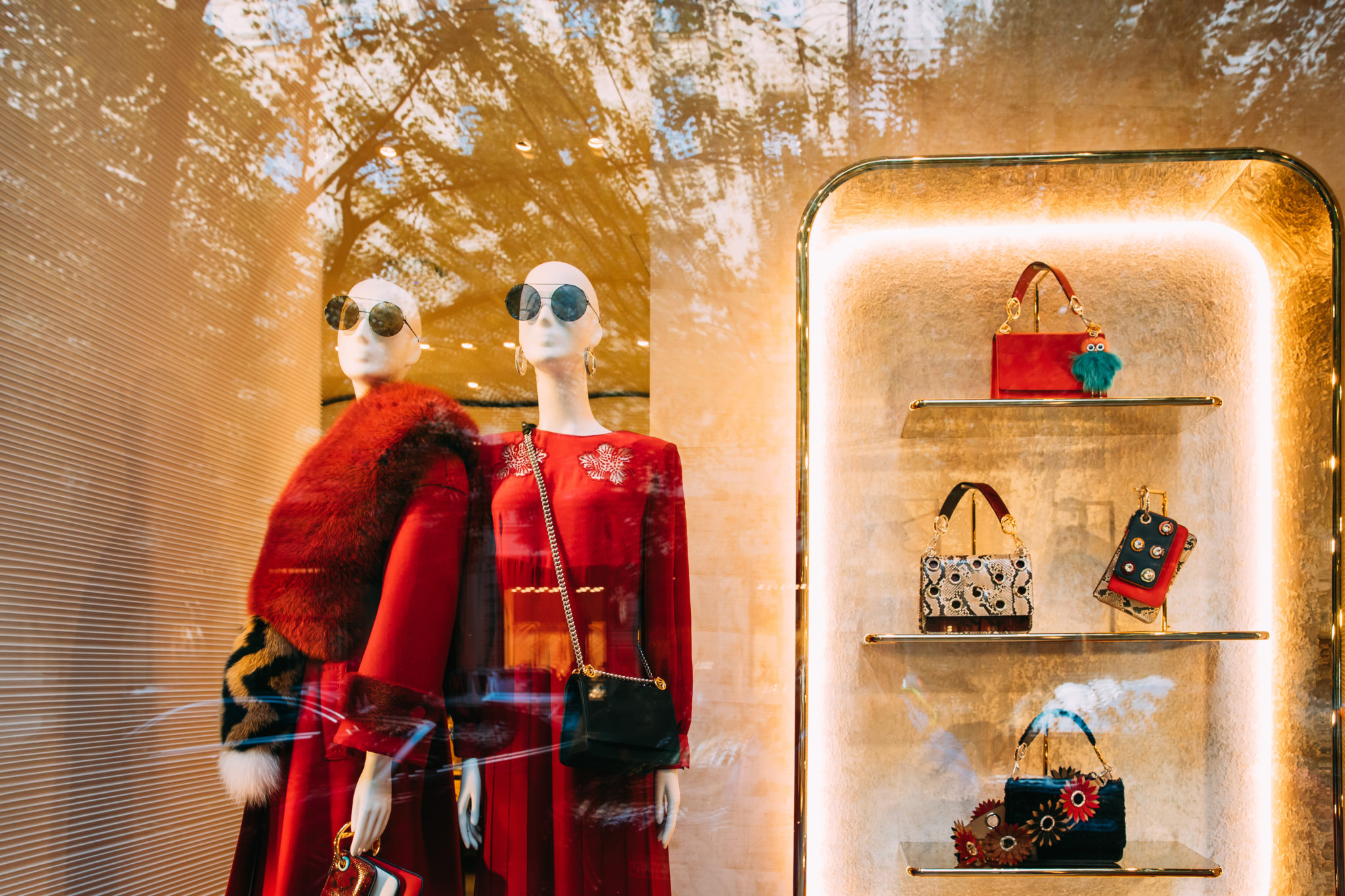 Female Mannequins And Fashion Accessories In Shop Window Showcase Of Store Mall Market.